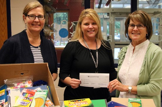 Lincoln Nebraska employees volunteering at a School Supply Drive