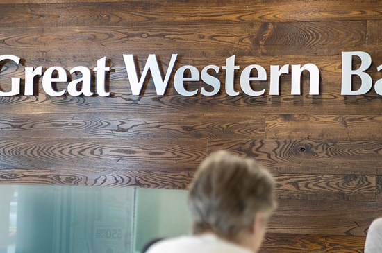 Great Western Bank teller line with employee and customer