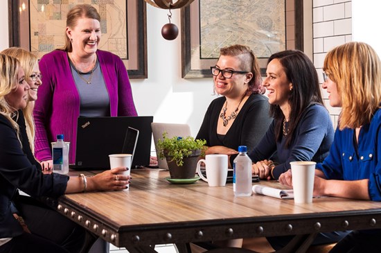 Women from Great Western Bank have coffee at a WomenConnect meeting in Sioux Falls